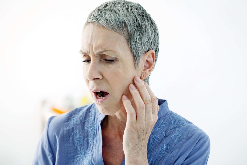 How to treat jaw lock from TMJ shutterstock 174171005 lock jaw tmj