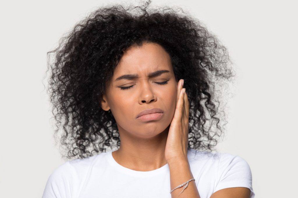 Stretches and At-Home Treatments for Jaw Tension AdobeStock 306841309 stretches and at-home treatments for jaw tension jaw pain